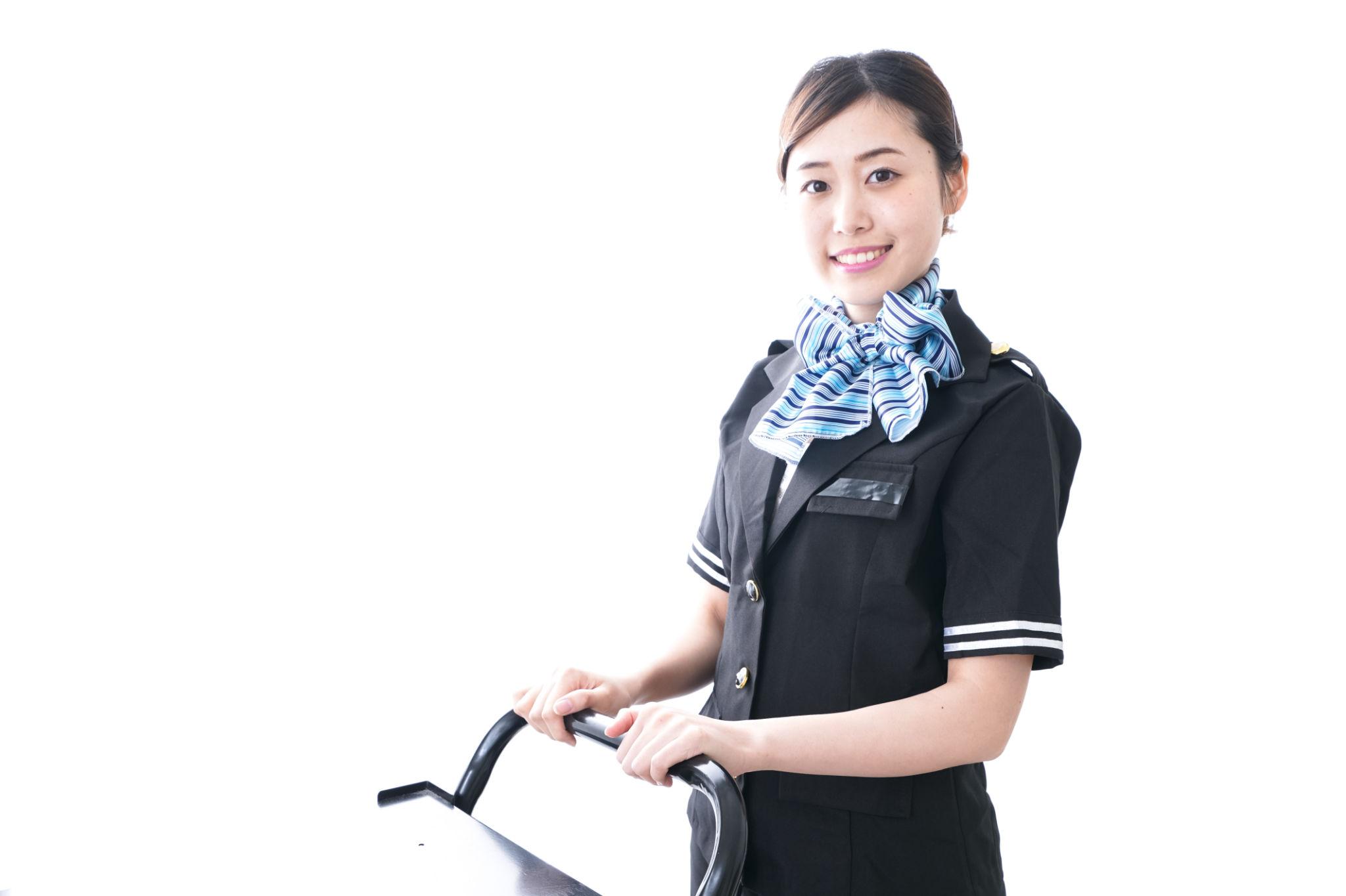 Cabin crew trainee with a service trolley during a cabin crew after 12th training program.